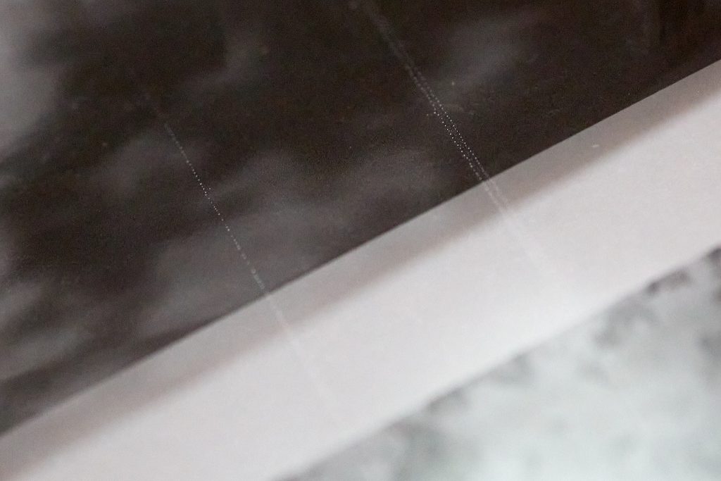 Scratches on a 120 negative developed by Harmanlab